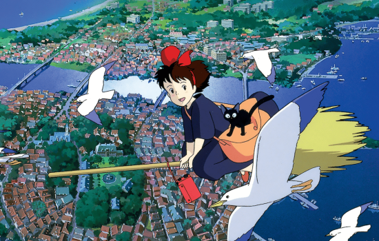 A young witch flies over a city on her broom.