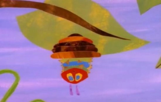The Very Hungry Caterpillar sits upside down on a leaf.