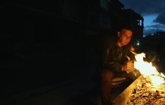 Promotional image for Life Support, featuring a man standing in front of a shadowy background.