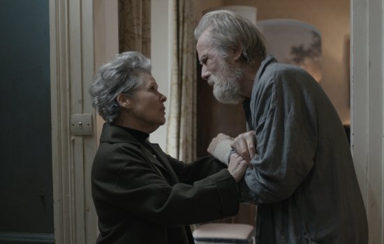 Bill Nighy and Imelda Staunton are locked in an intense embrace.