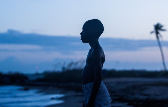 A still form the movie, Moonlight of a boy looking out to sea
