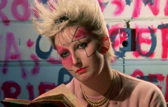 A woman has punky makeup on her face