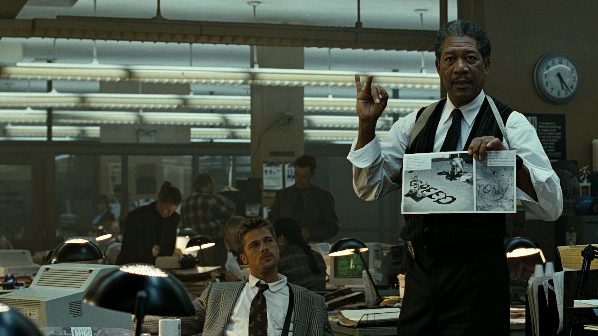 A still from the film Seven starring Brad Pitt and Morgan Freeman