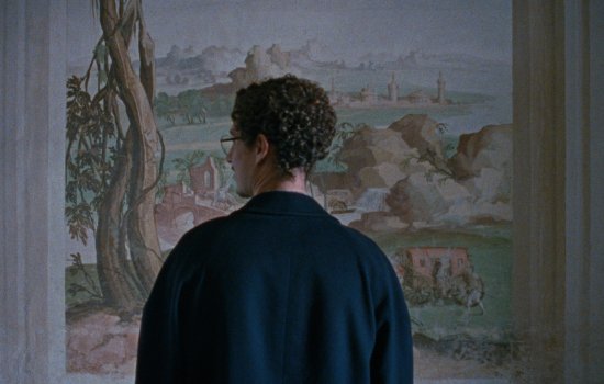 Promotional image for The Last One for the Road, featuring a person stood in front of a painted backdrop.