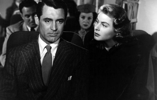 A black and white image of Cary Grant and Ingrid Bergaman.