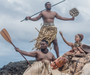 Three models pose as part of a series of images entitled 'Raise A Paddle' by Fenton Lutunatabua.