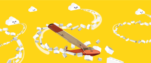 A bright red airplane flys through a yellow background filled with white legos and clouds.