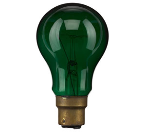 A filament light bulb with green glass against a white background.