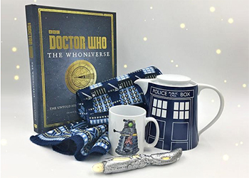 A selection of items on sale in the museum's Doctor Who shop, including a Dalek mug, TARDIS teapot, Dalek pattern tea towel and official 'The Whoniverse' book.