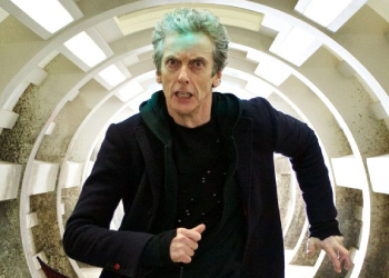 Peter Capaldi as the Twelfth Doctor running down a circular corridor in 2015's 'Under the Lake' episode. ™ & © BBC