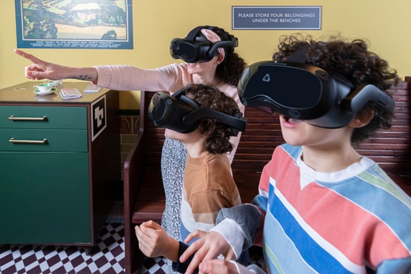 A family wearing VR headsets