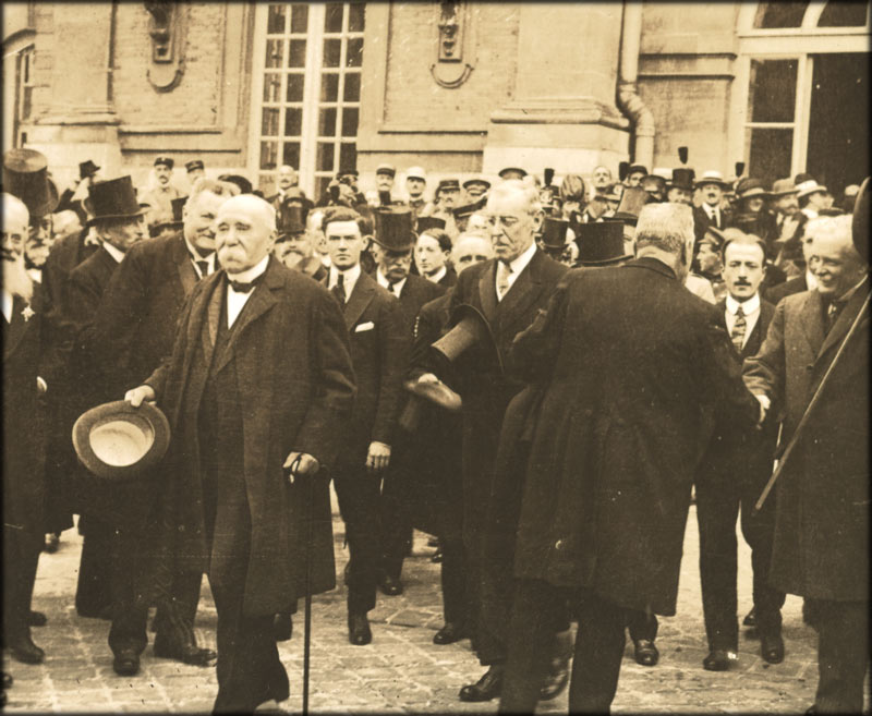 Clemenceau, Wilson and Lloyd George leaving Palace of Versailles after signing peace treaty.