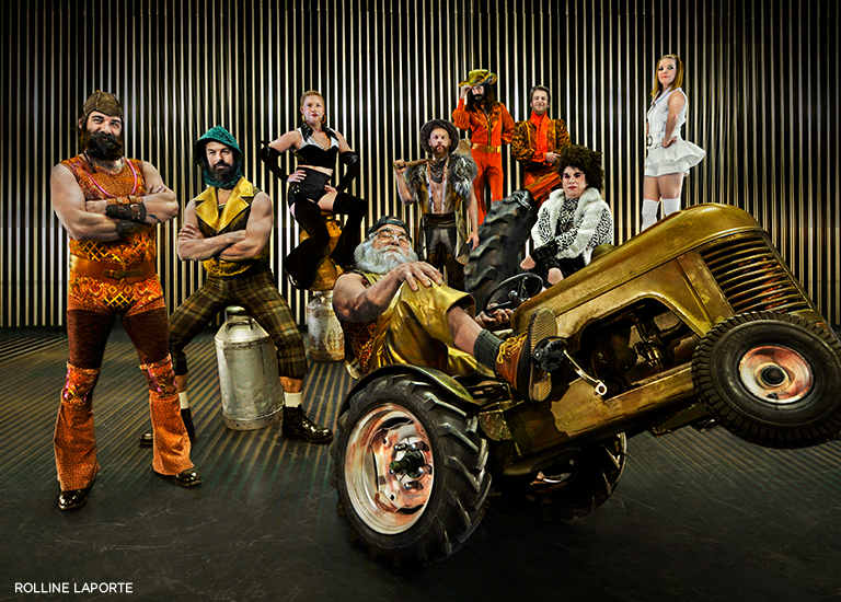 Photo of the artists of Cirque Alfonse and a big yellow tractor
