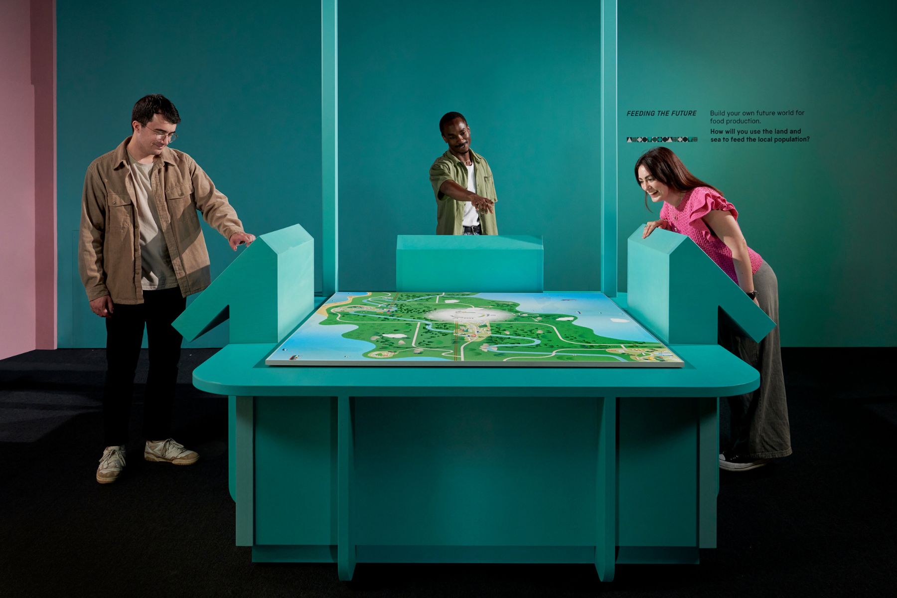 A family enjoying an interactive activity in Wonderlab gallery