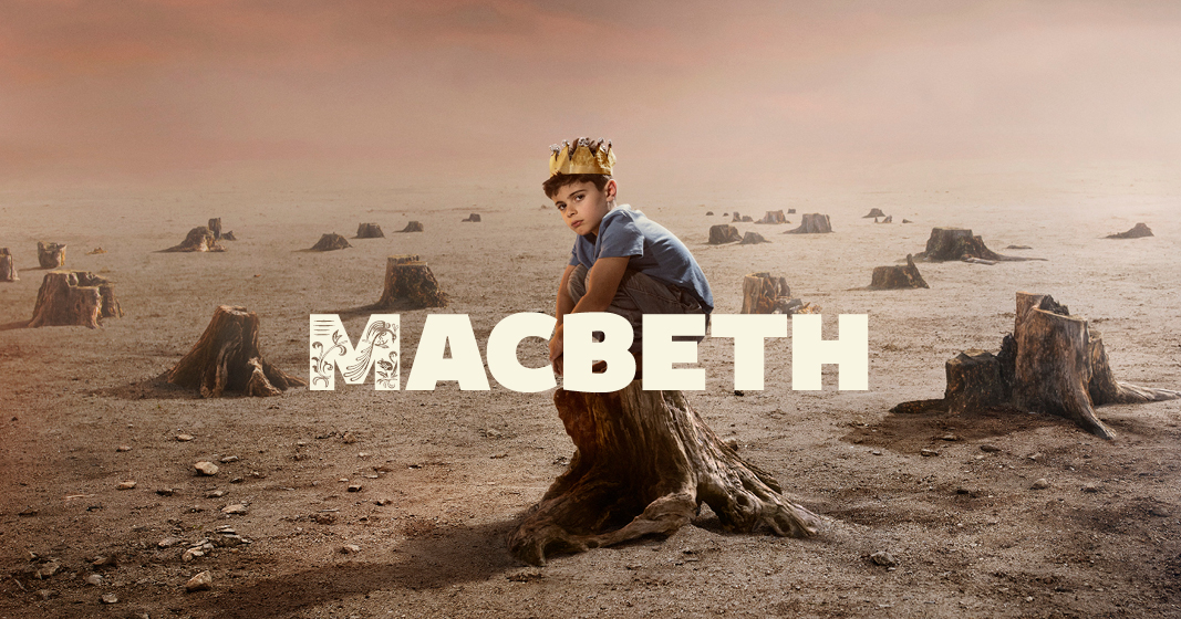 [IMAGE] A boy wearing a crown crouches on a tree stump. The words Macbeth are written across.
