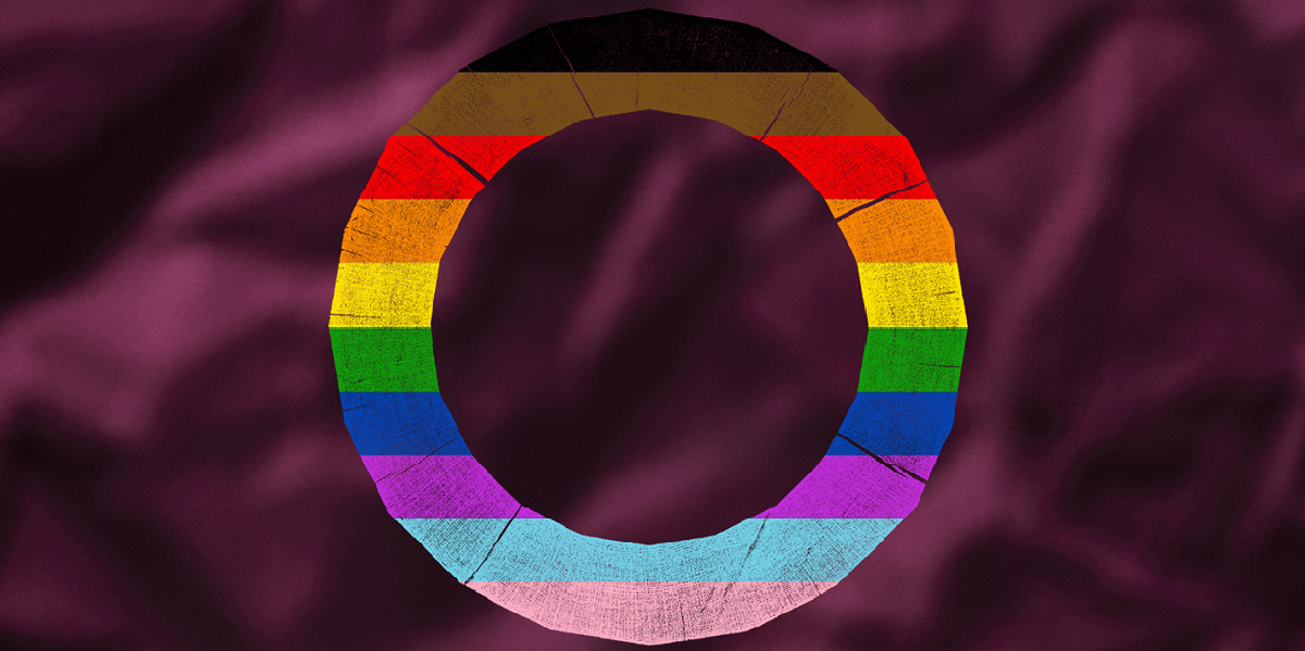 [Image] A Globe round logo in the colours of the inclusive Pride flag in front of a rich purple cloth background.