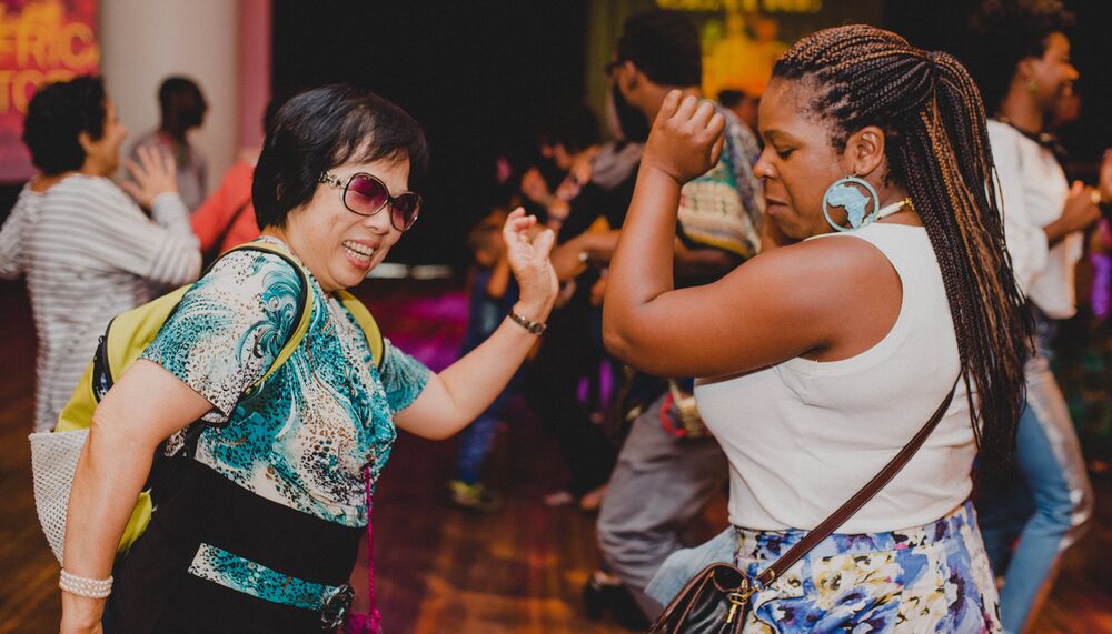 Image of people dancing in the Clore Ballroom