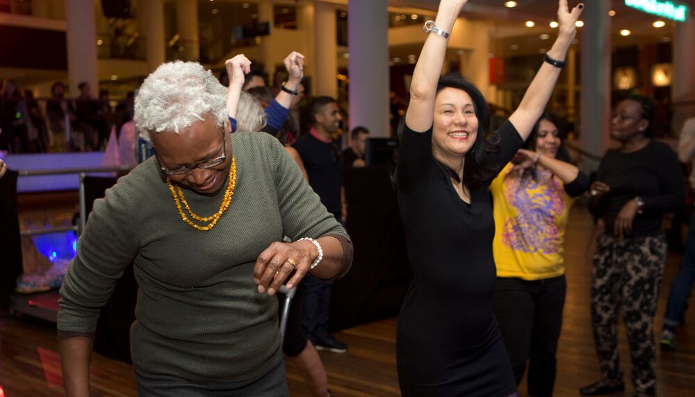 People dancing in the Clore Ballroom