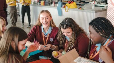 A group of students doing a creative activity.