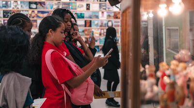 Two students stood in front of an installation inside the Hayward Gallery