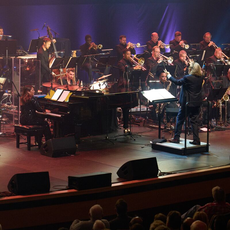 Jazz Voice in concert with orchestra on stage