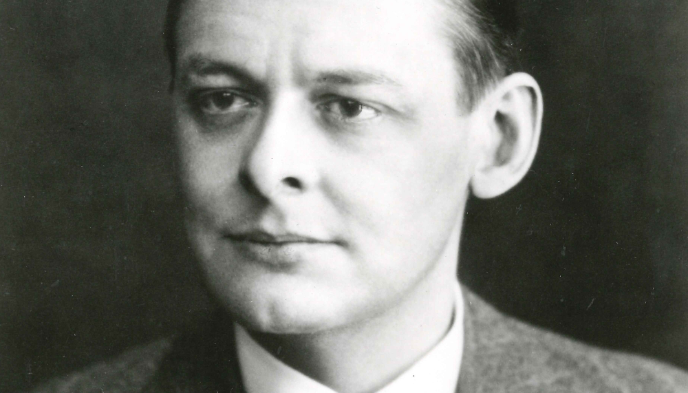 A black and white photograph of TS Eliot
