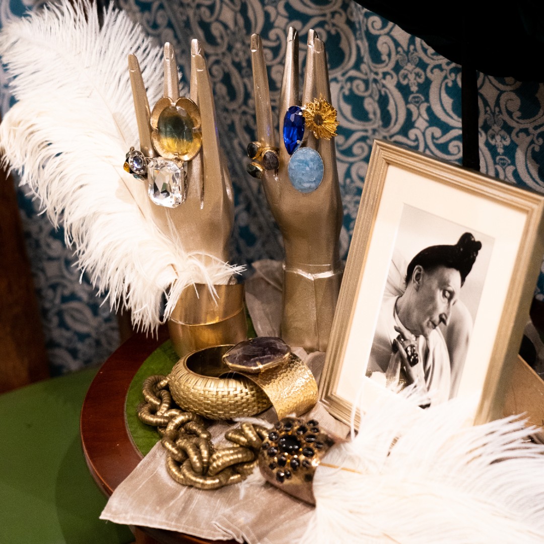Install shot of exhibition with jewellery and feathers 