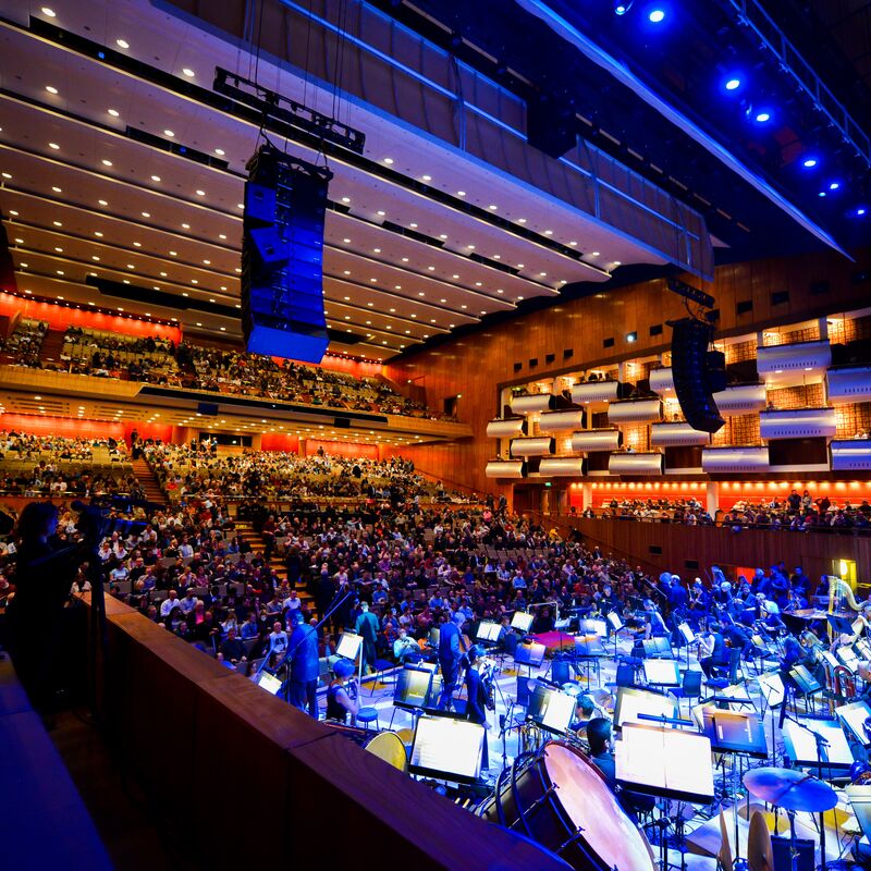A crowded Royal Festival Hall seen from the stage