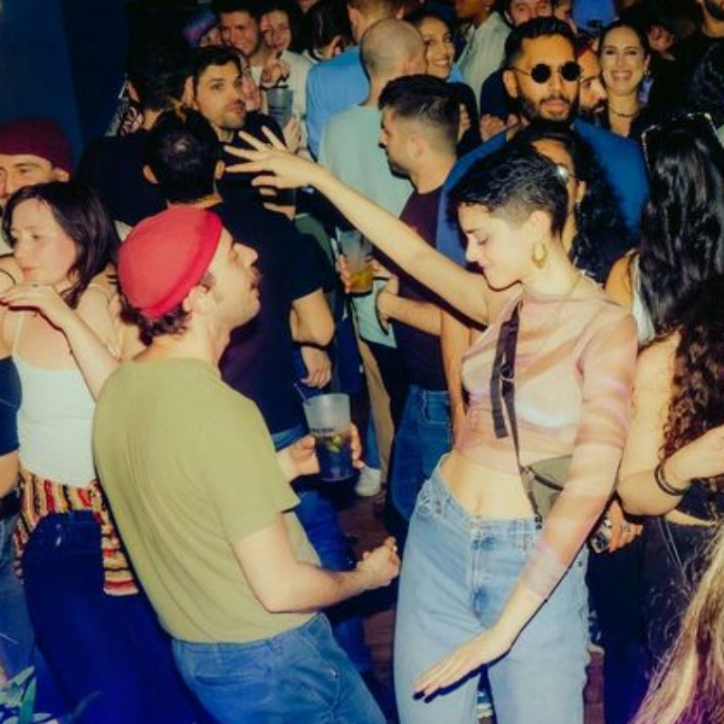 A crowd dancing at a Guava Jamz DJ event.