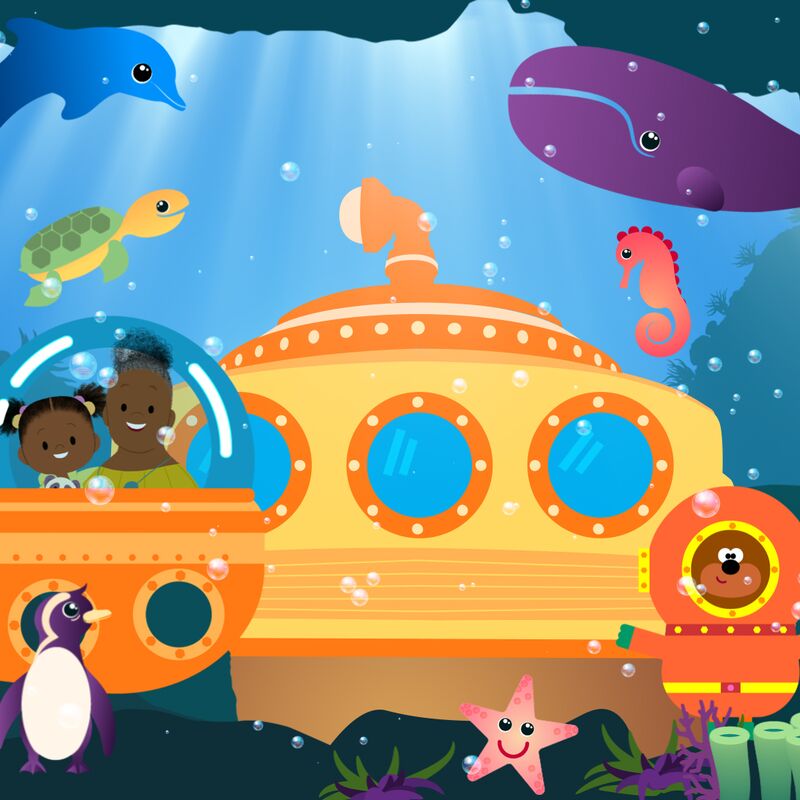 Cartoon of two characters in a submarine, surrounded by various seacreatures