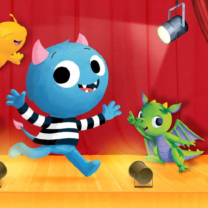 Colourful cartoon monster characters performing on a stage with red curtains. 