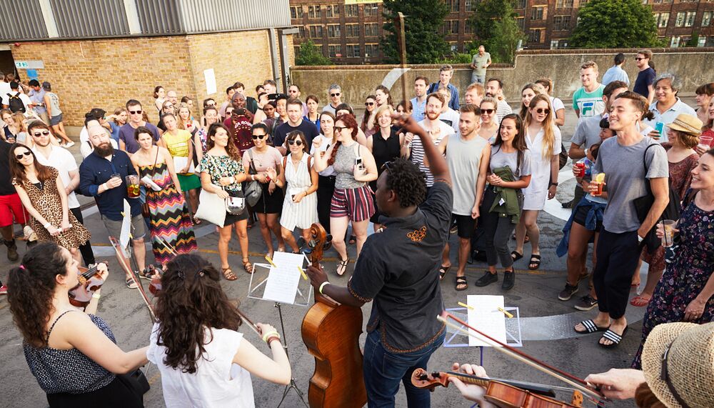 Multistory orchestra performs its Living Notes programme in Kings Cross area.