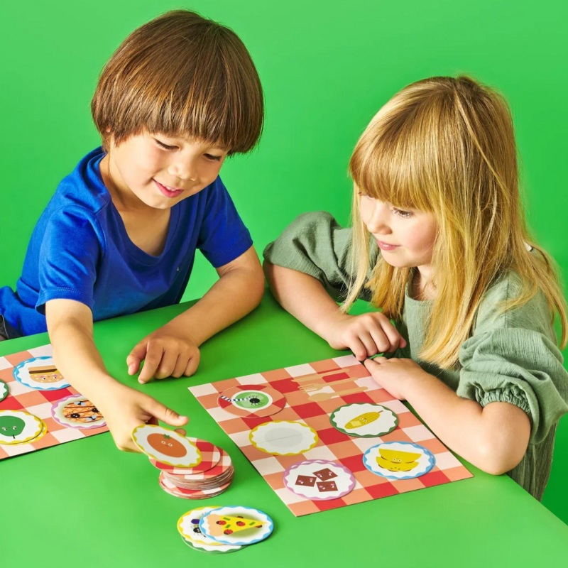Image of the children playing with a picnic game