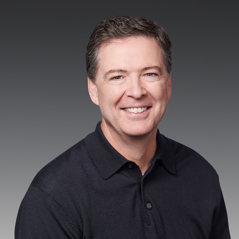 Author James Comey wearing a black long sleeved shirt