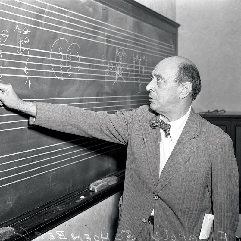 Arnold Schoenberg at a blackboard