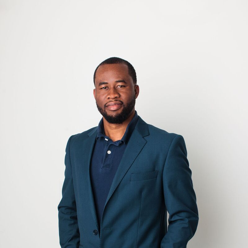 Chigozie Obioma wearing a blue suit