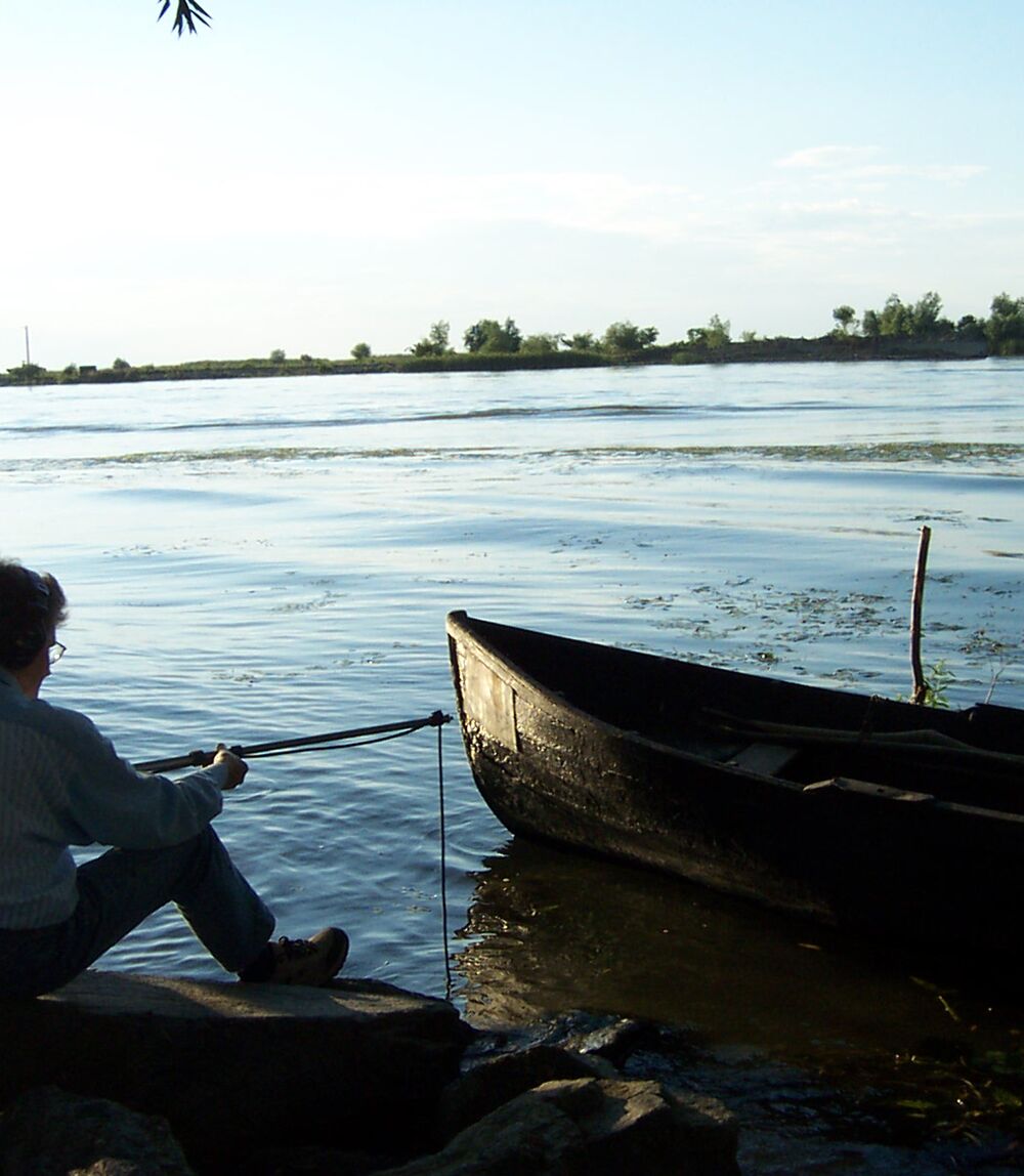 Annea Lockwood fishing at a lake