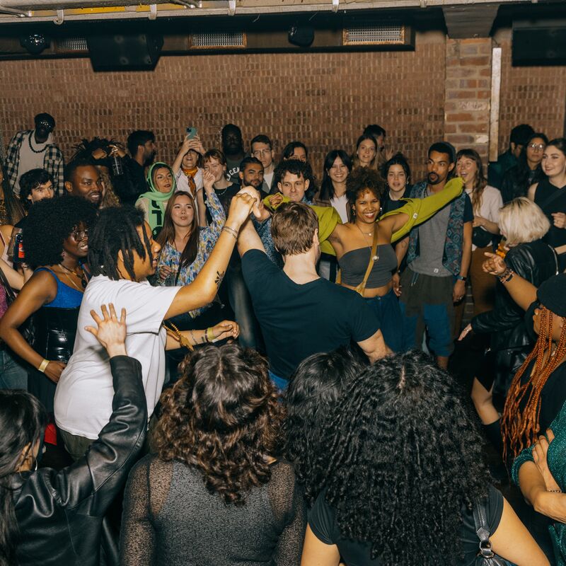 A crowd of people dancing