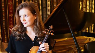 Ivy Pemberton holding her violin