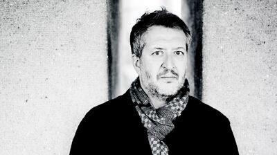 Thomas Adès wearing a patterned scarf