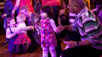 Father and daughter at dance workshop