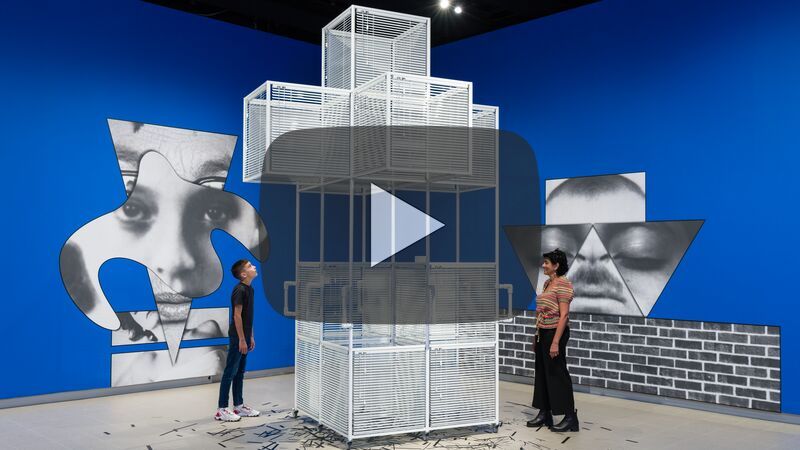 Two people look at a sculpture in the Hayward Gallery