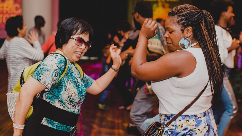 Two people dancing in the Clore Ballroom