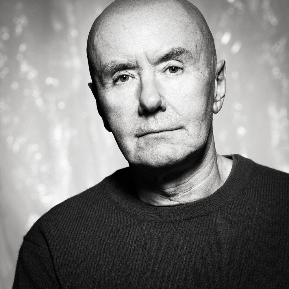 Black and white photograph of Irvine welsh in a dark jumper.
