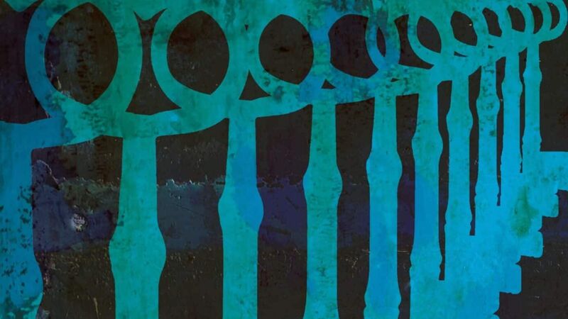 Image of turquoise keys arranged in a row.