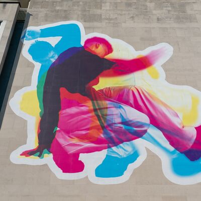 Artwork with three images overlaying each other in different dance shape and different colour
