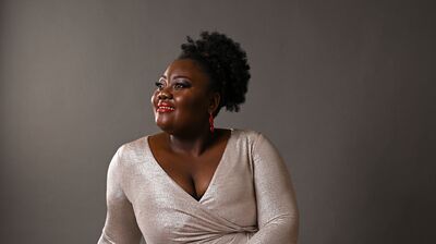 Masabane Cecilia Rangwanasha sitting on a padded chair
