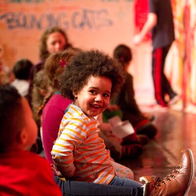 Young boy enjoying a performance during the Imagine Festival at the Southbank Centre