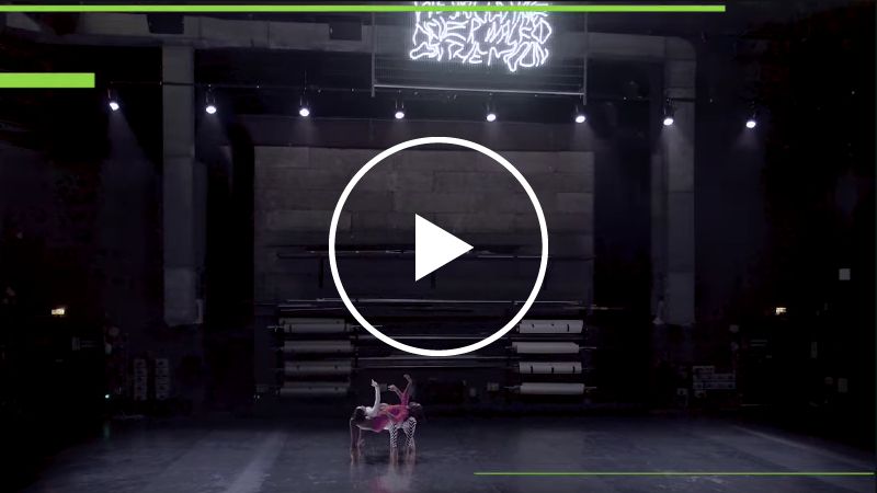 A screenshot from a video showing dancers from LA(HORDE). A play button is overlaid on the image, to signify that it will link to a void if clicked on.