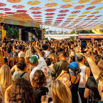 Crowd of people talking and dancing